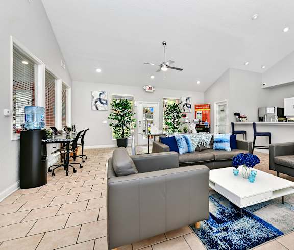 Living room with ceiling fan at Village Lakes, Orlando, FL